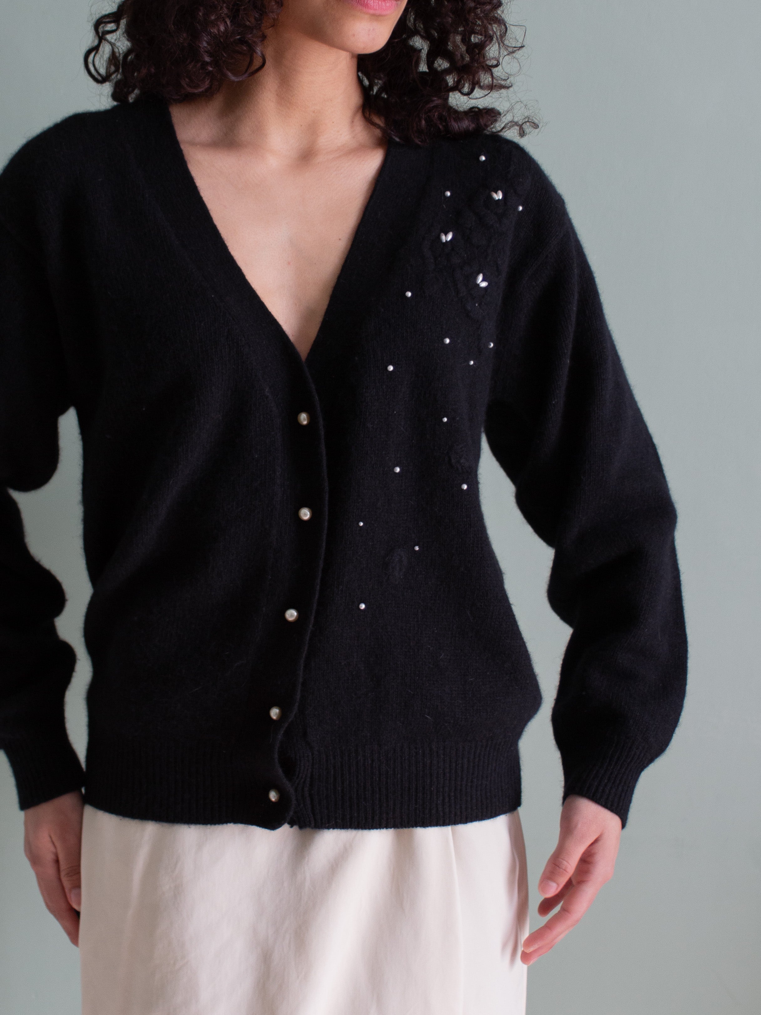 Cardigan con applicazioni